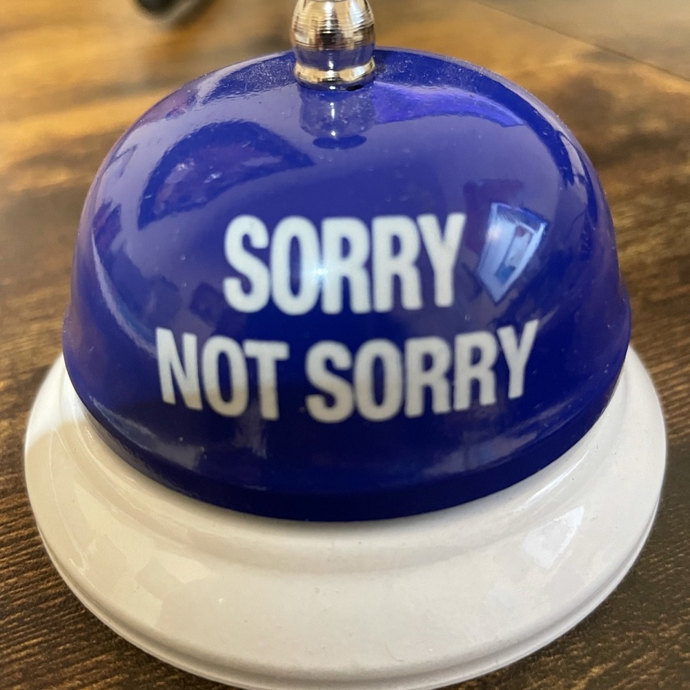 Sorry not sorry bell office desk decor